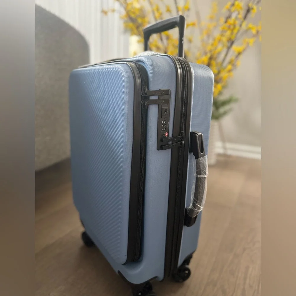 New! 🧳✈️🌎 CALPAK 22” Hardside Carry-on Spinner With Front Pocket in Amalfi Blu